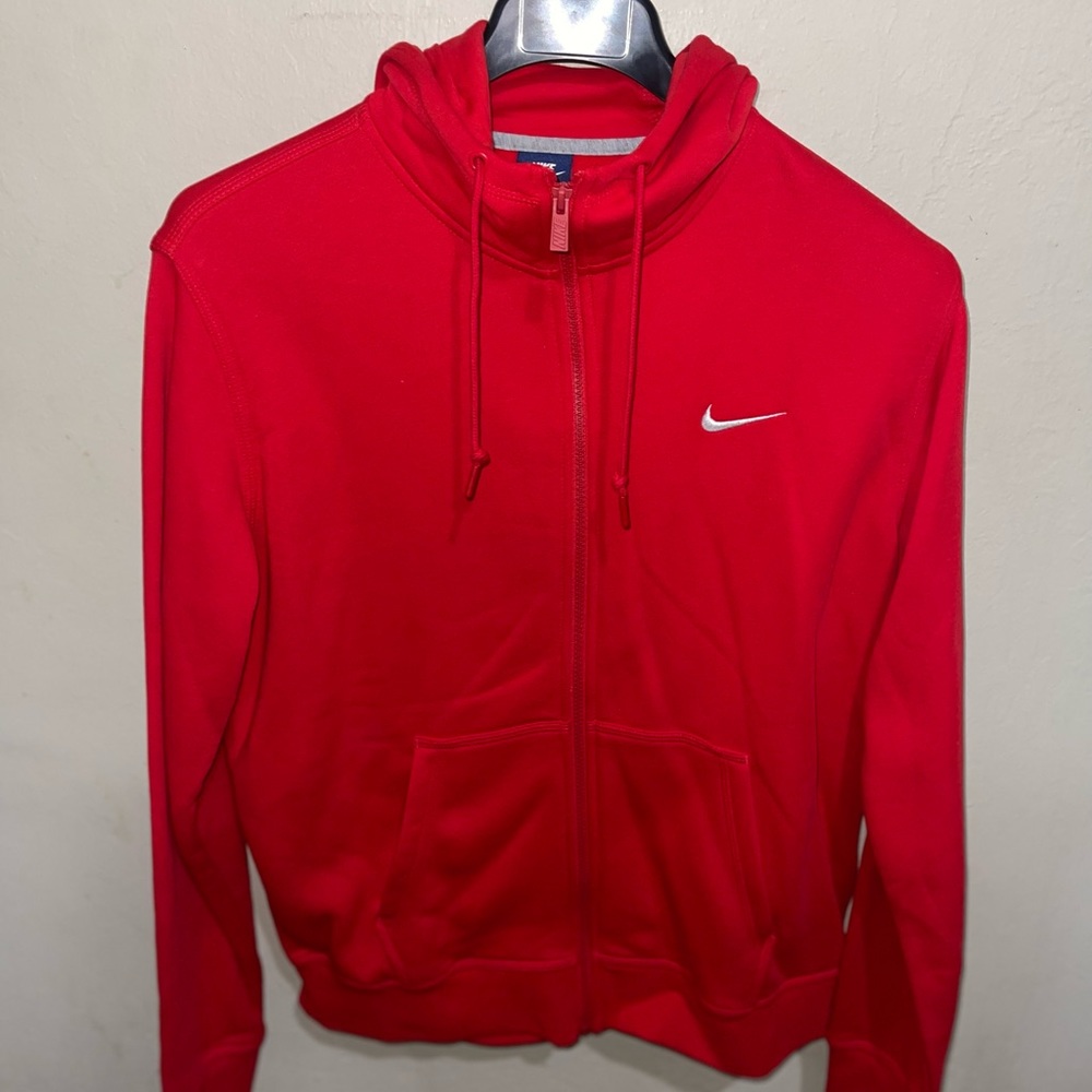 Red Nike zip up sweater. Size: Large
